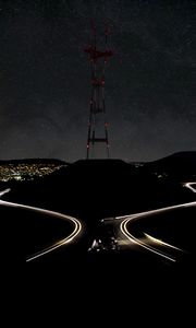 Preview wallpaper hill, tower, night, lights, road, dark