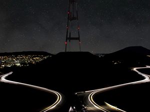 Preview wallpaper hill, tower, night, lights, road, dark