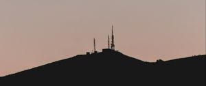 Preview wallpaper hill, tower, sunset, silhouette