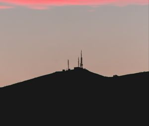 Preview wallpaper hill, tower, sunset, silhouette