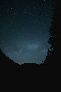 Preview wallpaper hill, trees, starry sky, night, dark