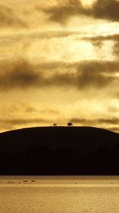 Preview wallpaper hill, trees, sunset, sea, sky