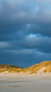 Preview wallpaper hills, beach, clouds, sky, dark, landscape