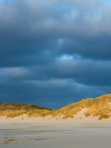 Preview wallpaper hills, beach, clouds, sky, dark, landscape