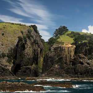 Preview wallpaper hills, cliff, sea, rocks, foam