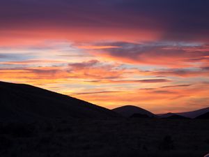Preview wallpaper hills, clouds, sky, sunset, dark