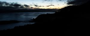 Preview wallpaper hills, coast, sea, silhouettes, evening