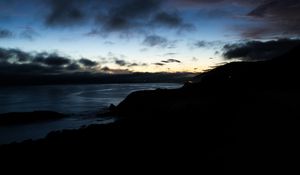 Preview wallpaper hills, coast, sea, silhouettes, evening