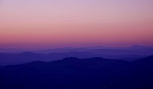 Preview wallpaper hills, distance, dusk, sunset