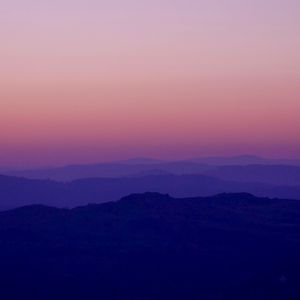 Preview wallpaper hills, distance, dusk, sunset