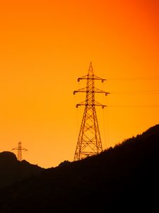 Preview wallpaper hills, electric poles, dusk, sunset, orange