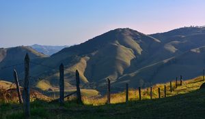Preview wallpaper hills, fence, relief, nature, landscape