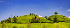 Preview wallpaper hills, field, trees, clouds, landscape