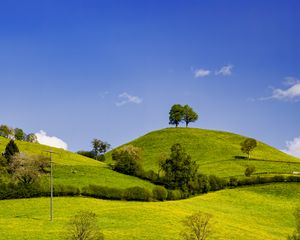 Preview wallpaper hills, field, trees, clouds, landscape