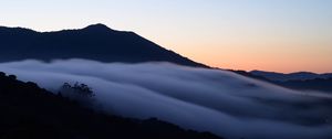 Preview wallpaper hills, fog, clouds, dark, sunrise