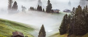 Preview wallpaper hills, fog, trees, buildings, slope