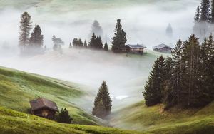 Preview wallpaper hills, fog, trees, buildings, slope