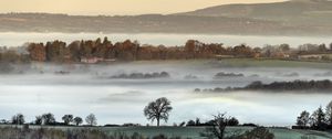 Preview wallpaper hills, fog, trees, aerial view, landscape