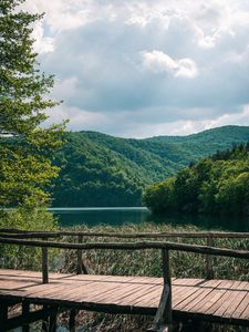 Preview wallpaper hills, forest, trees, lake, bridge, landscape