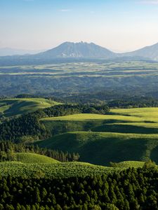 Preview wallpaper hills, grass, mountains, trees, landscape