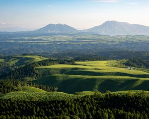 Preview wallpaper hills, grass, mountains, trees, landscape