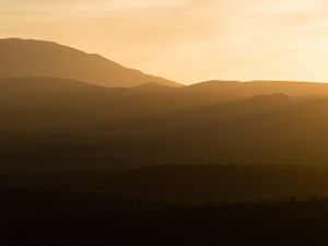 Preview wallpaper hills, grass, sunrise, light, nature