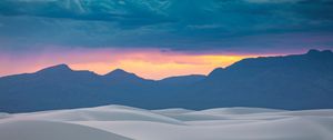 Preview wallpaper hills, horizon, sunset, sky, clouds