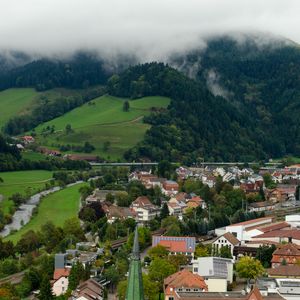 Preview wallpaper hills, houses, buildings, forest, clouds