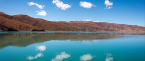 Preview wallpaper hills, lake, reflection, clouds