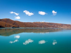 Preview wallpaper hills, lake, reflection, clouds