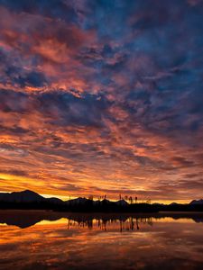Preview wallpaper hills, lake, water, sunset, evening