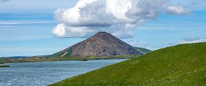 Preview wallpaper hills, landscape, mountain, sea, flowers