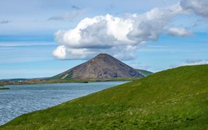 Preview wallpaper hills, landscape, mountain, sea, flowers