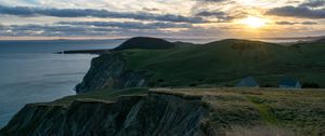 Preview wallpaper hills, landscape, sea, clouds, sky