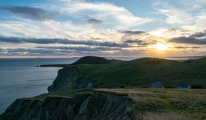 Preview wallpaper hills, landscape, sea, clouds, sky