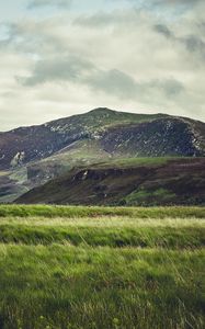 Preview wallpaper hills, mountain, grass, valley, nature