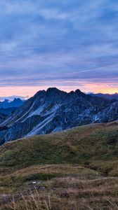 Preview wallpaper hills, mountains, clouds, sky, sunset, landscape