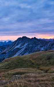 Preview wallpaper hills, mountains, clouds, sky, sunset, landscape