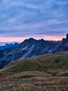 Preview wallpaper hills, mountains, clouds, sky, sunset, landscape