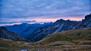 Preview wallpaper hills, mountains, clouds, sky, sunset, landscape