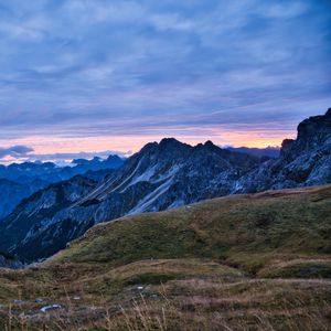 Preview wallpaper hills, mountains, clouds, sky, sunset, landscape