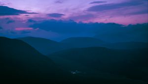 Preview wallpaper hills, mountains, clouds, twilight, light, dark