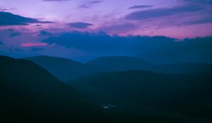 Preview wallpaper hills, mountains, clouds, twilight, light, dark