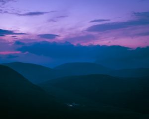 Preview wallpaper hills, mountains, clouds, twilight, light, dark