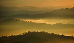 Preview wallpaper hills, mountains, fog, clouds, trees, sky
