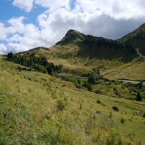 Preview wallpaper hills, mountains, grass, nature, sky