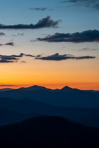 Preview wallpaper hills, mountains, horizon, sunset, sky