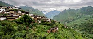 Preview wallpaper hills, mountains, houses, trees