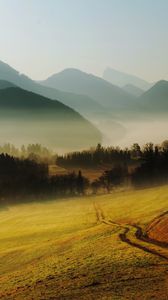 Preview wallpaper hills, mountains, road, country, morning, fog, relief