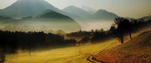 Preview wallpaper hills, mountains, road, country, morning, fog, relief